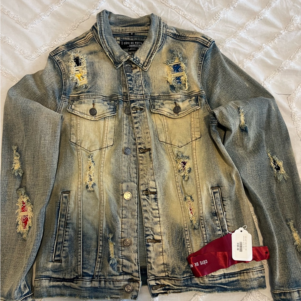 Distressed Denim Jacket with Red Accents